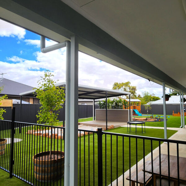 Up-N-Grow-Early-Learning-Centre-Freeling-secure-outdoor-playground-grass-sandpit